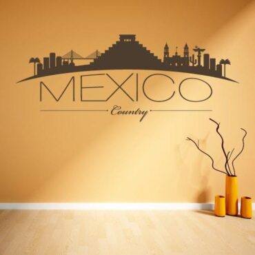 Primer izgleda čokoladno rjave samolepilne stenske nalepke Mexico ukrivljen na bež steni v dnevni sobi.